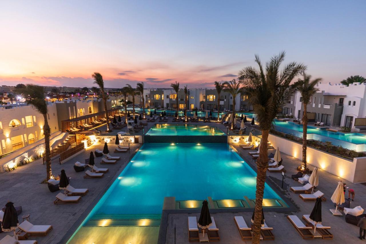 Sunrise Tucana Resort Grand Select Hurghada Exterior photo The resort at sunset