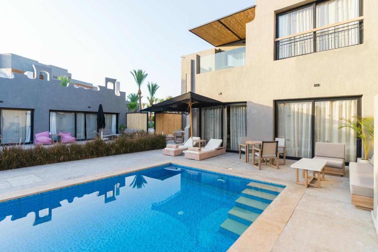 Sunrise Tucana Resort Grand Select Hurghada Exterior photo The swimming pool at the hotel