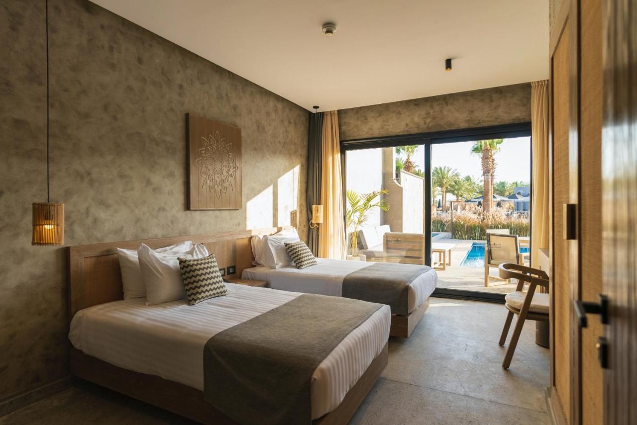 Sunrise Tucana Resort Grand Select Hurghada Exterior photo Deluxe room with direct pool access